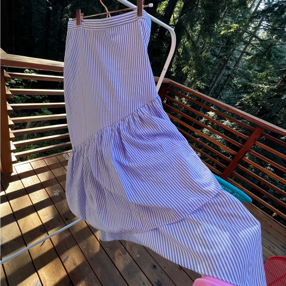 Lightweight white and blue striped skirt. High low hem, angled ruffle size M